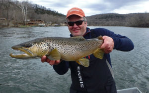 Kelly Neuman with a HUGE White River Brown Trout
